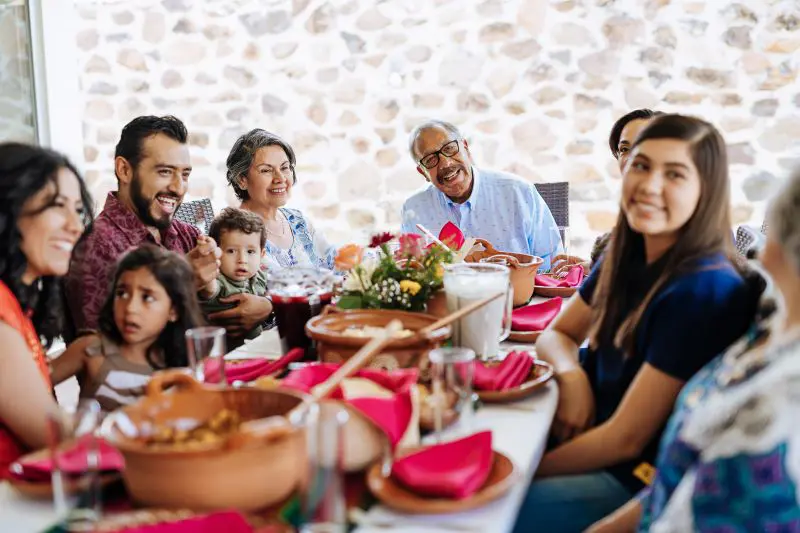 Latin family around a dinner table