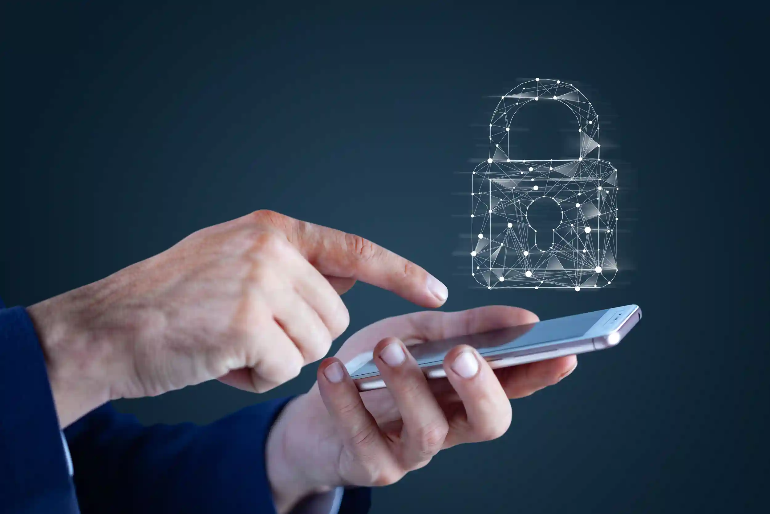 Cybersecurity lock over a phone screen.