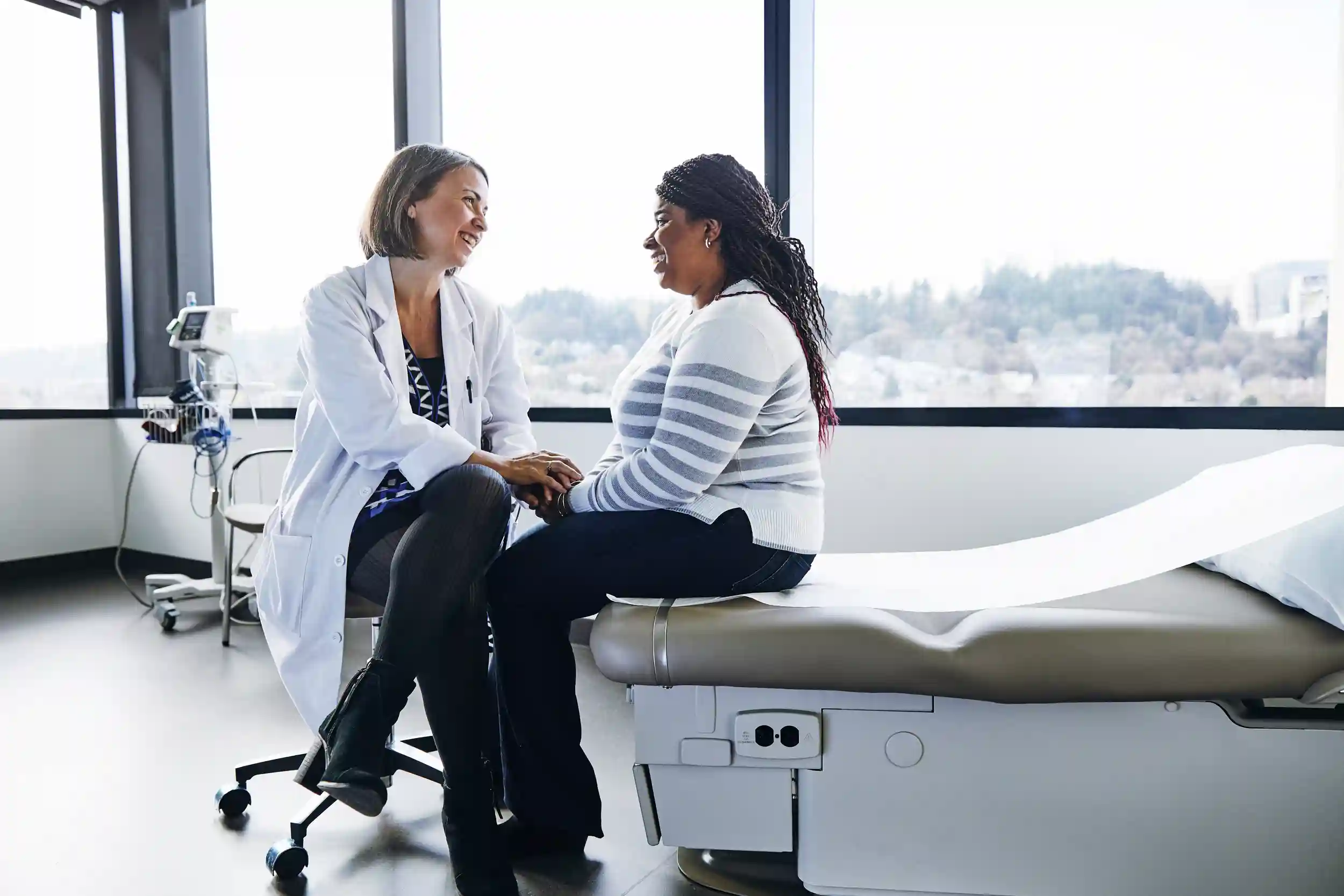 Woman talking with her doctor.