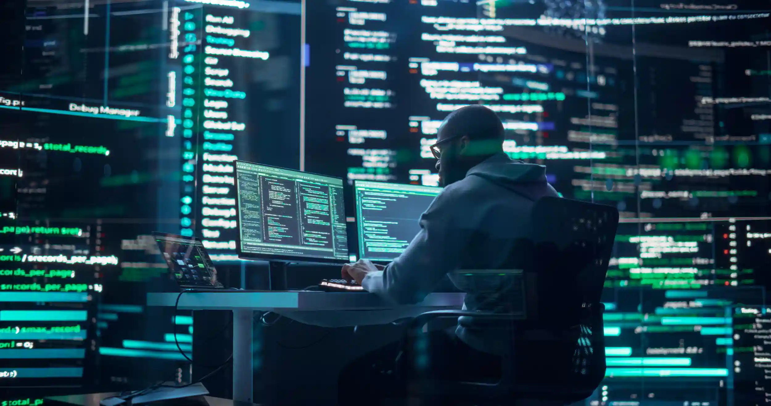 A person looking over cyber security breach.